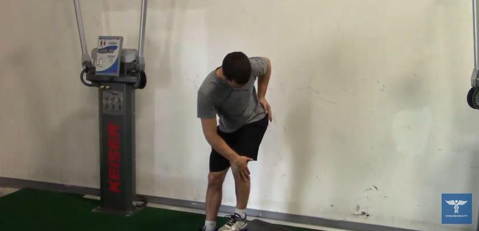 Standing Posterior Capsule Stretch