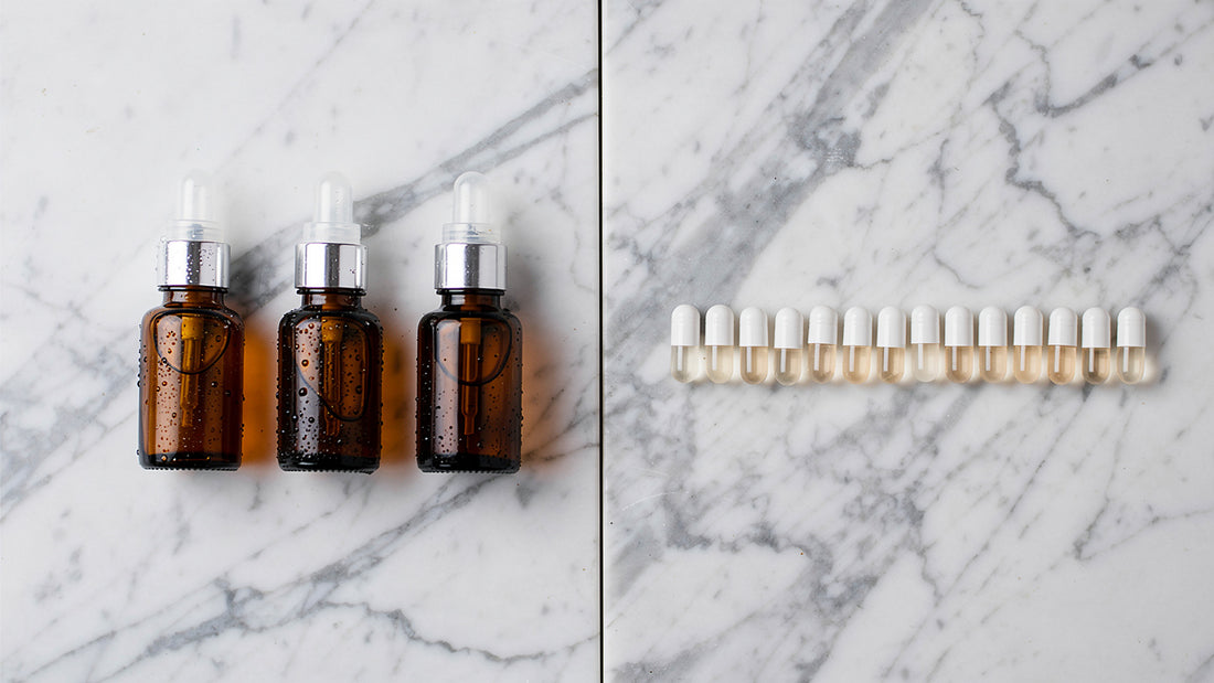 Flat lay comparing nasal spray bottles and supplement capsules